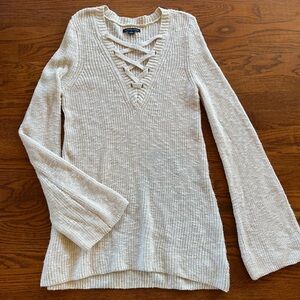 Elegant Cream Sweater with Lace-Up V-Neck